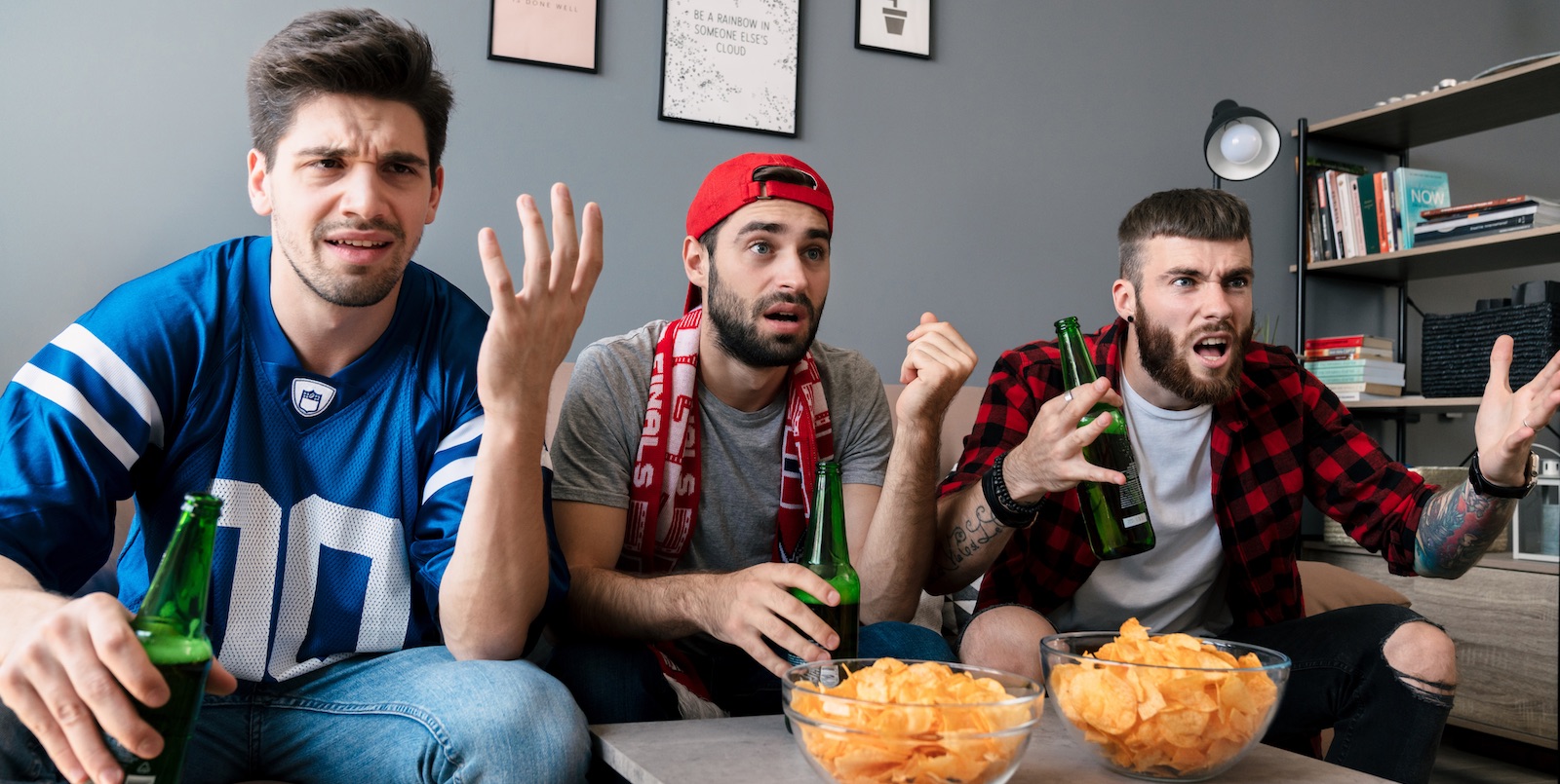 A photo of guys watching a game